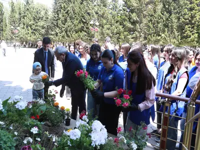 Flower planting campaign held ...